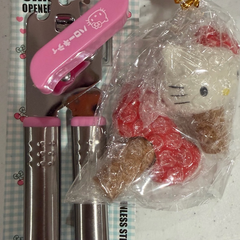 Hello Kitty can opener and wine stopper bundle